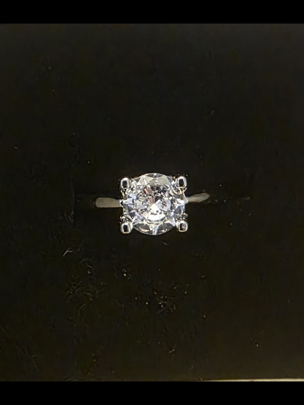 Round-Cut White Stone Solitaire Ring in Sterling Silver